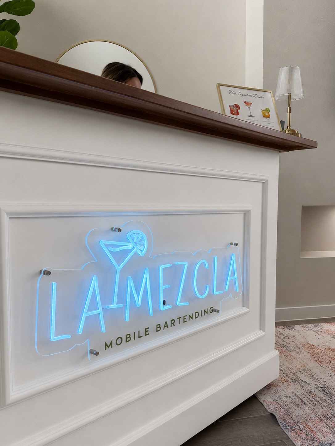 The La Mezcla bar with signature neon sign