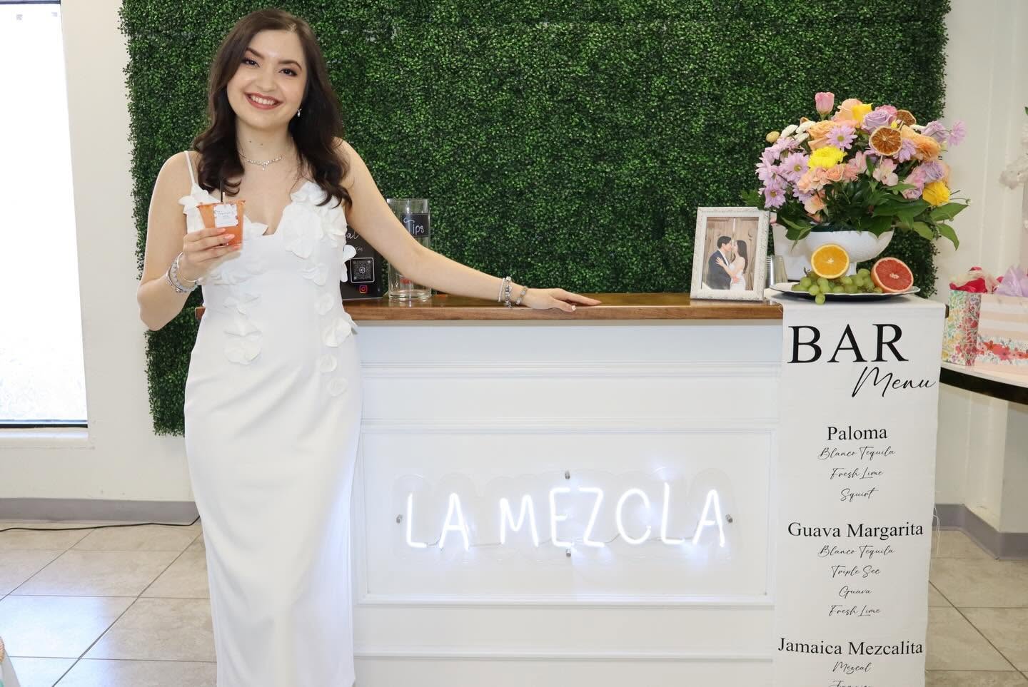 Guest enjoying the bridal shower La Mezcla bar setup