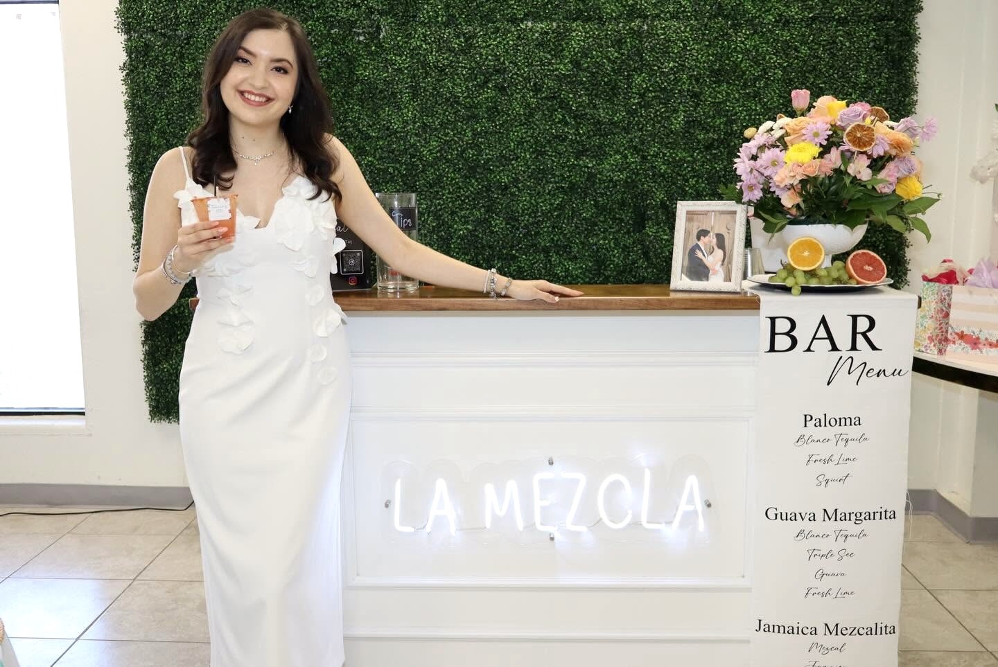 Guest enjoying the bridal shower La Mezcla bar setup