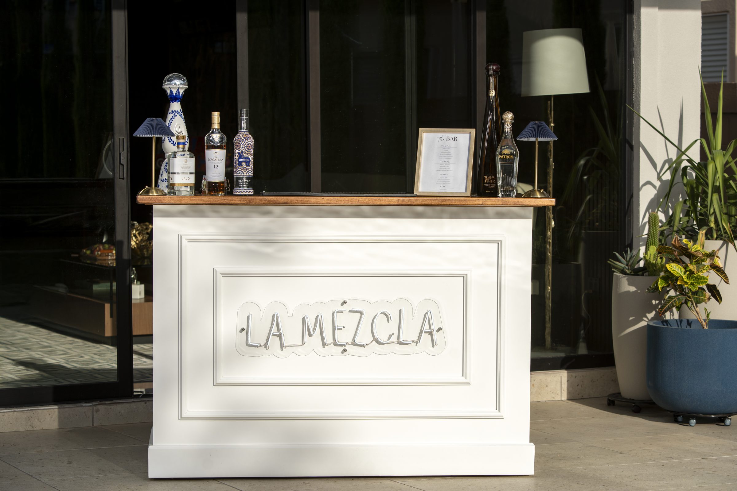 The La Mezcla mobile bar styled with premium bottles